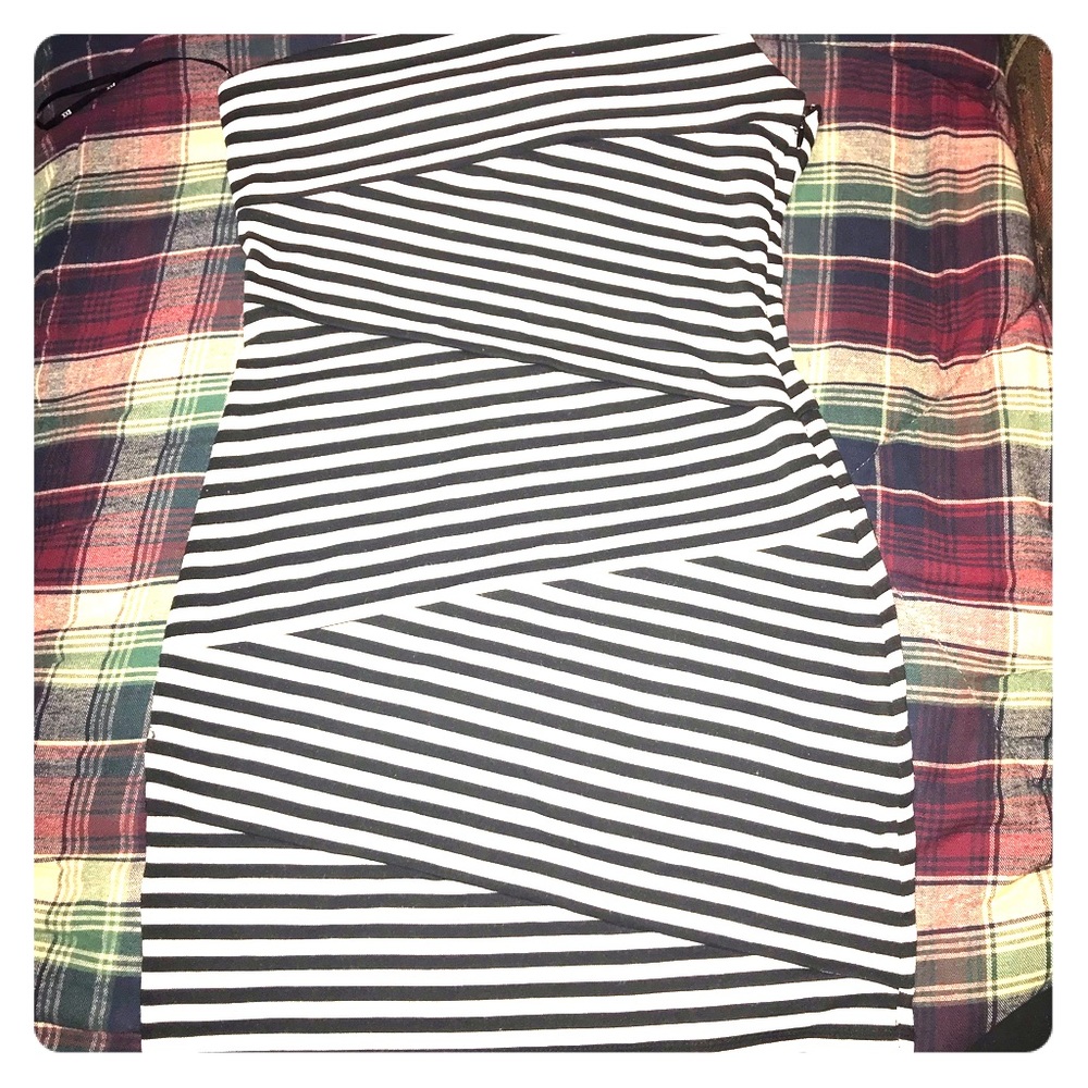 Off one shoulder stripped dress.
